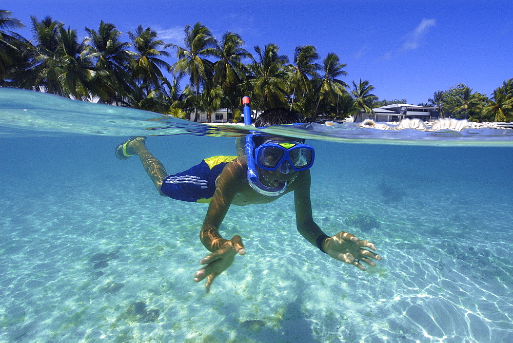 Split image of Marshalhese boy and coconut trees, Ailuk island, Ailuk atoll, Marshall Islands, Pacific