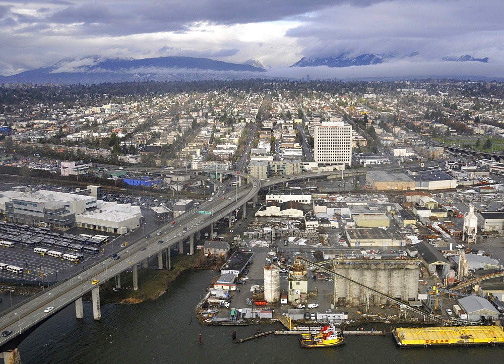 Aerial view of Arthur Laing bridge, Fraser River, Vancouver and mountain range, British Columbia, Canada, North America