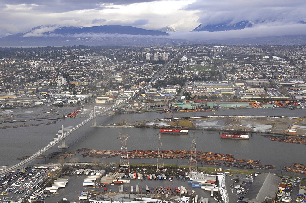 Aerial view of Oak Street Bridge, Fraser River, Vancouver and mountain range, British Columbia, Canada, North America