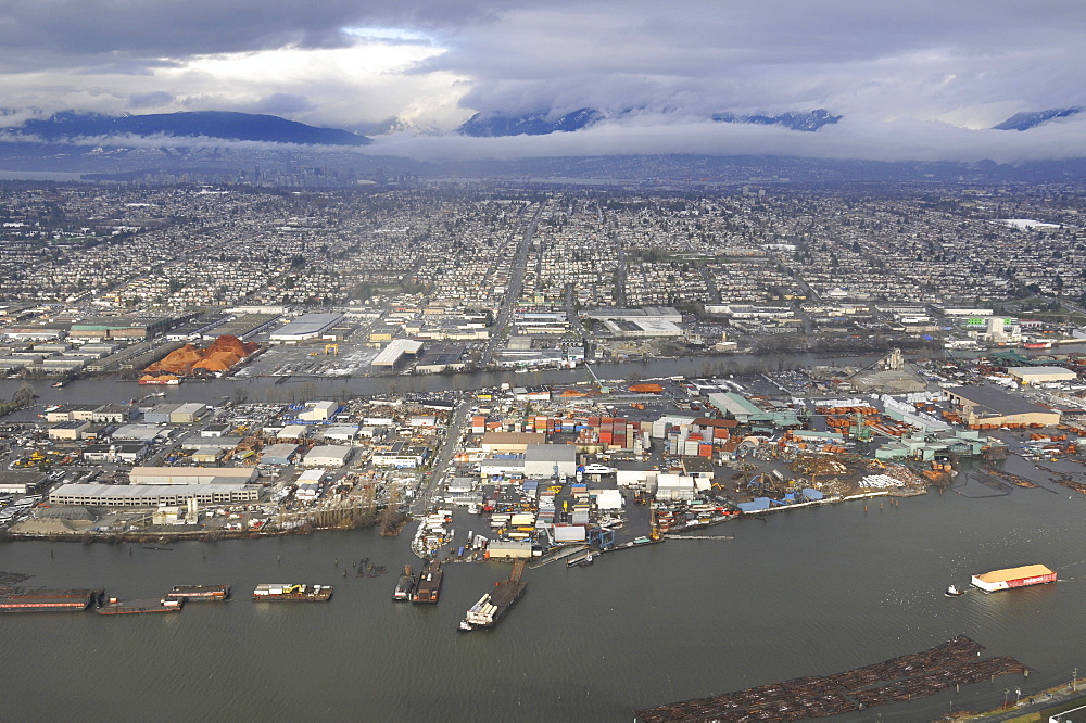 Aerial view of Fraser River, Vancouver and mountain range, British Columbia, Canada, North America