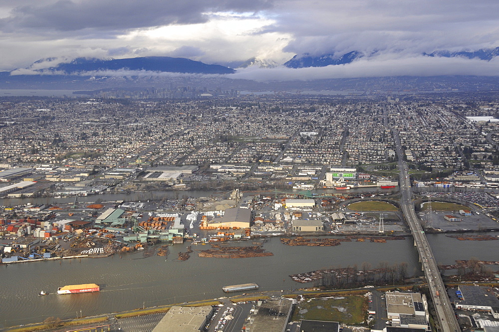 Aerial view of Knight Street Bridge, Fraser River, Vancouver and mountain range, British Columbia, Canada, North America