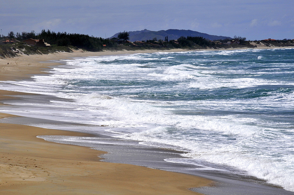 Wave breaking at Praia Mole, Florianopolis, Santa Catarina, Brazil, South America