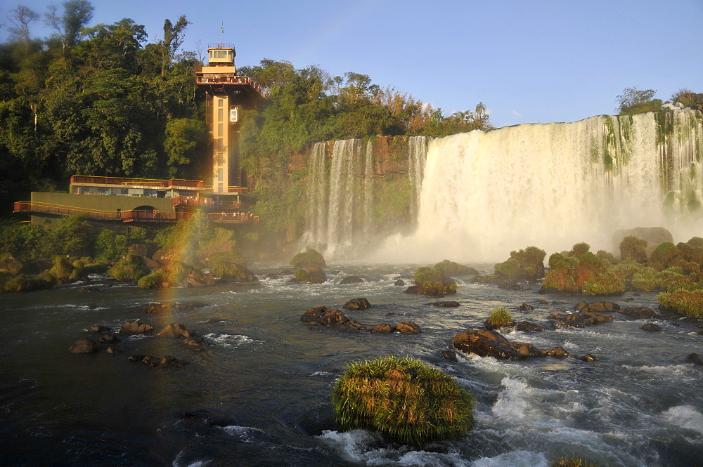 Observation tower and rainbow, Iguassu Falls, Foz do Iguacu, Iguacu National Park, UNESCO World Heritage Site, Parana, Brazil, South America