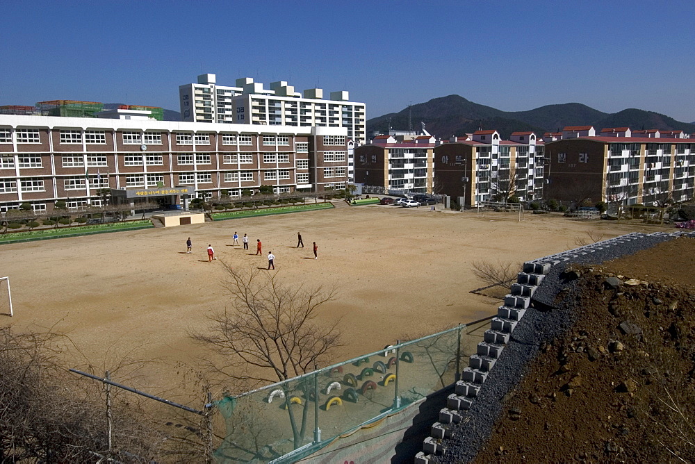 Soccer pitch and school, Geoje-Do, South Korea, Asia