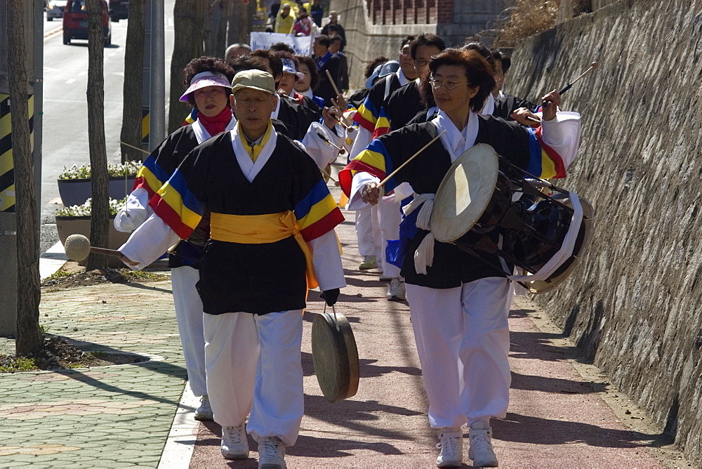 Peace demonstrators walking in traditional costumes, Geoje-Do, South Korea, Asia