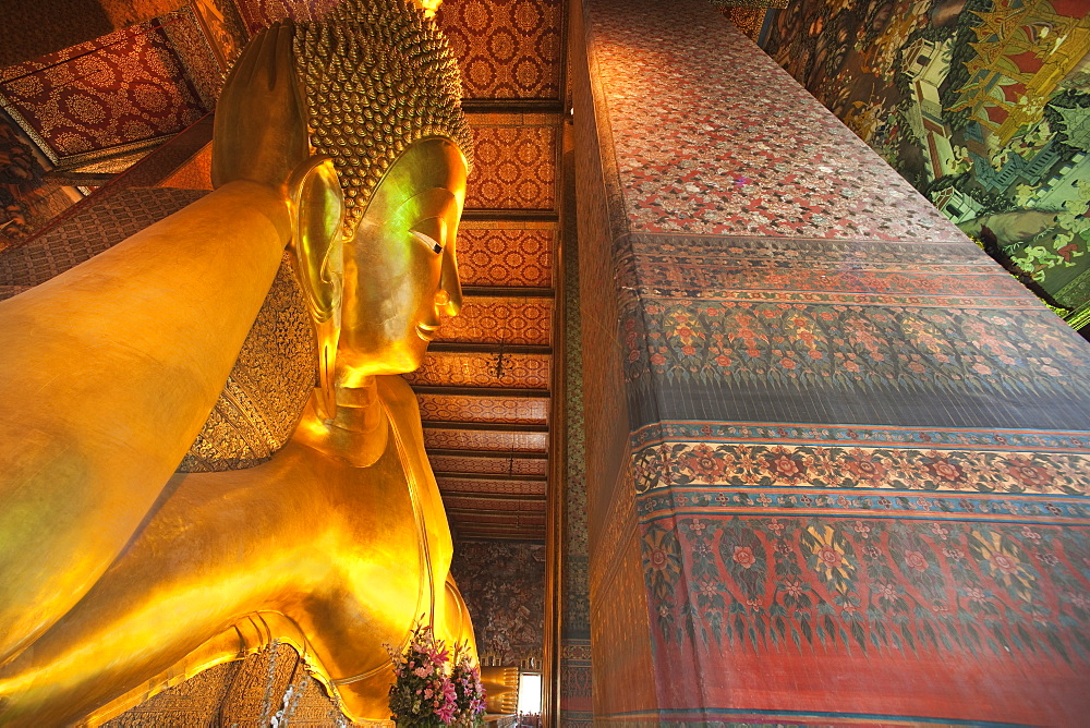 Wat Pho, the Temple of the Reclining Buddha.  Bangkok, Thailand, Asia.   Worlds Largest Reclining Buddha