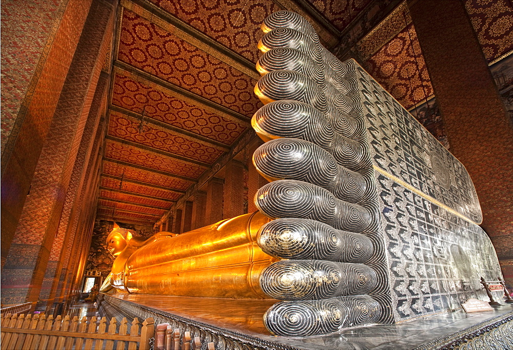 Wat Pho, the Temple of the Reclining Buddha.  Bangkok, Thailand, Asia.   Worlds Largest Reclining Buddha