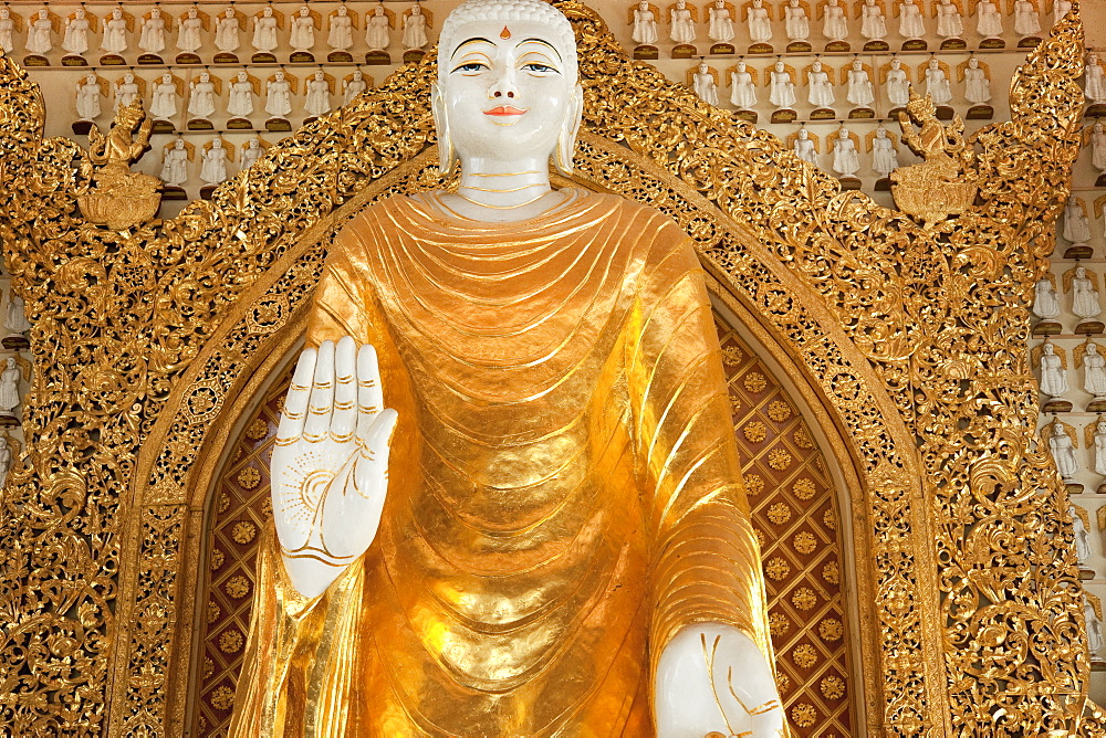 Sime Hall, verry tall marble Buddha, standing statue, Dhammikarama Burmese Temple.  George Town, Thailand, Asia