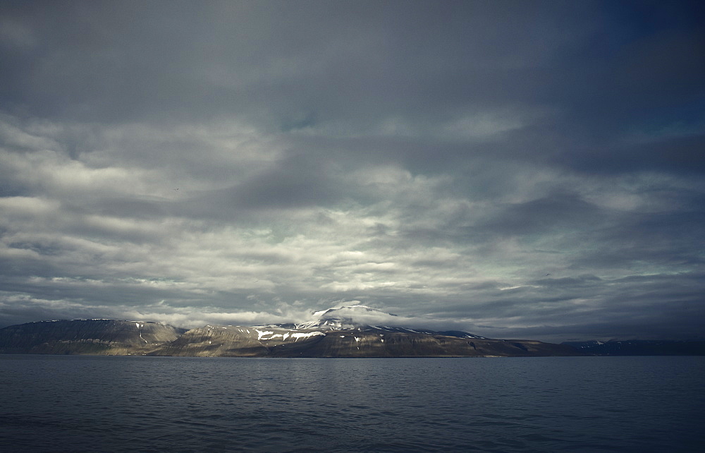 Seascape with mountain in the background. Longyearbyen, Svalbard, Norway