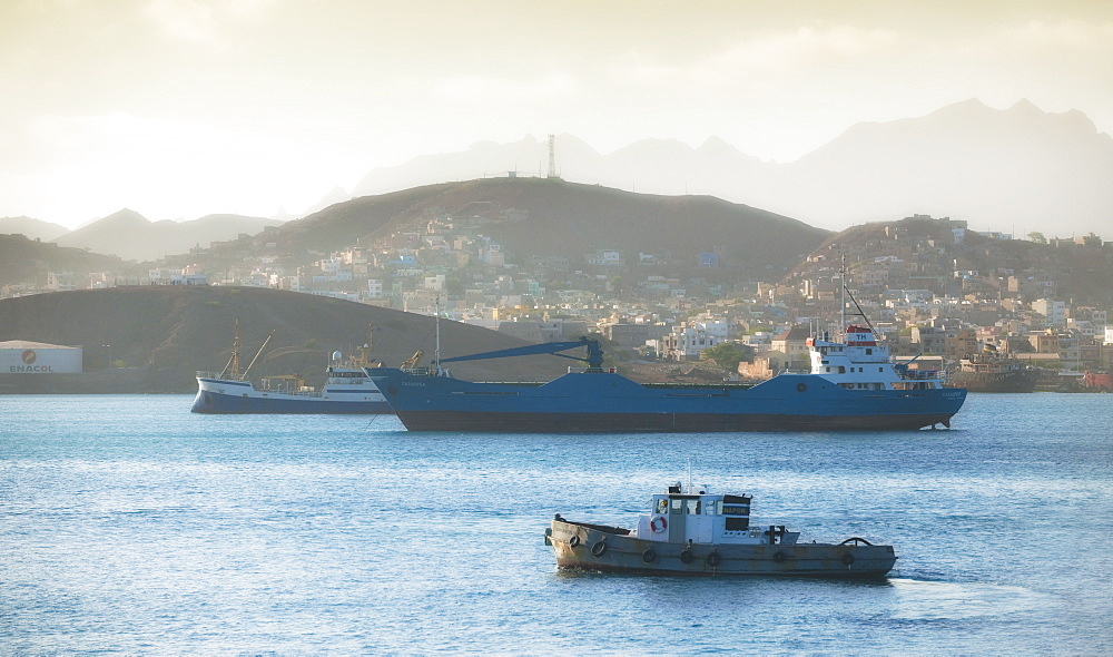 04/04/2009, Early morning, Mindelo Harbour, Tug boat, Cargo ships with mindelo and surrounding mountains. Mindelo, Mindelo Harbour, Sao Vicente Island. Cape Verde Islands