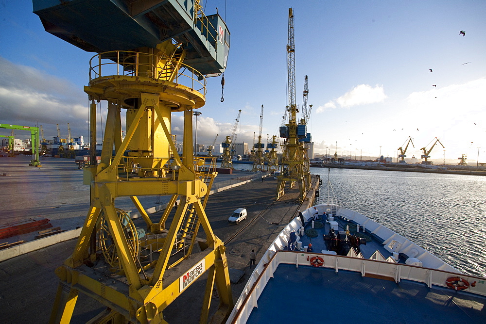 Dock Yards, crane, industry, Ship Clipper Adventurer, entering port, evening. Casablanca, Port Of Casablanca, Morocco