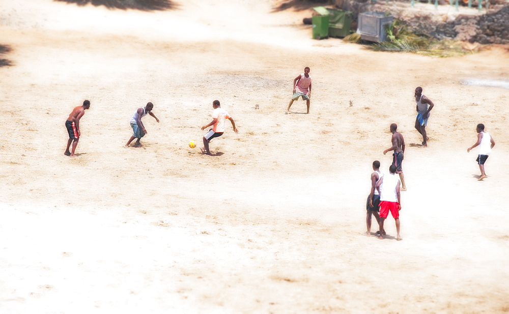 03/04/2009. Tarrafal bay Town Beach. Children and teenagers enjoy their local beach in the mid day. The Cape Verde islands have a large population percentage of youths. . Praia, Tarrafal , Sao Tiago Island. Cape Verde