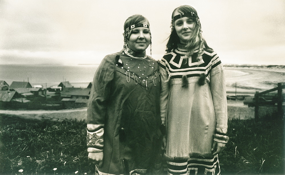 23/06/2008 Two local girls, traditional inuit dress, town center of Nikolskoye Village, Bearing Sea, Russia, Asia