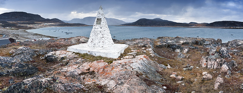 Land mark stone, and view of harbour. Cape Dorset, Baffin Island, Qikiqtaaluk, Nunavut, Canada, North America