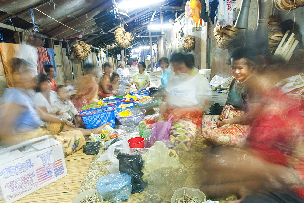 Iban Long House comunity, distributing goods. Kuching, Sarawak, Borneo, Malaysia, South-East Asia, Asia