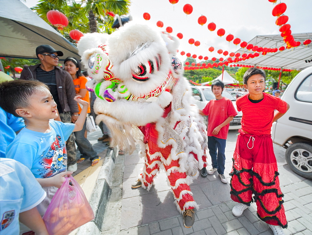 Sunday markets, dragon, festival.  Kota Kinabalu, Sabah, Borneo, Asia