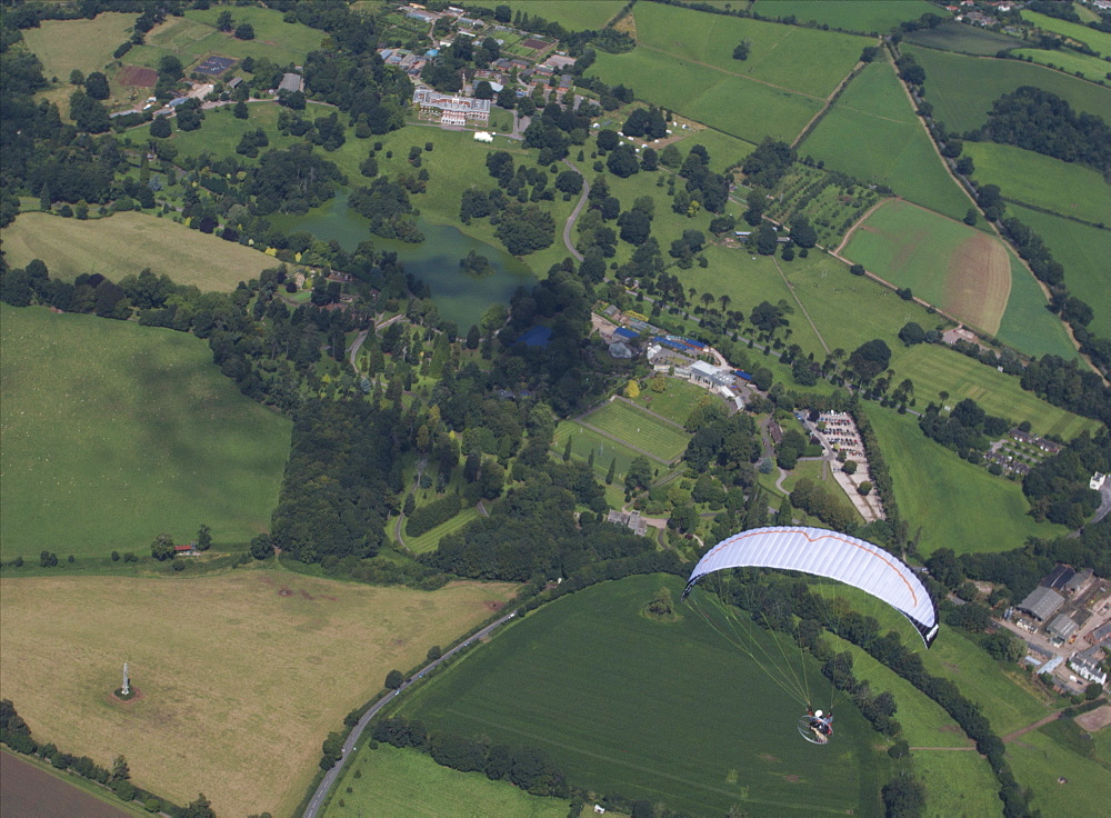 aerial views  of Paramotoring over the countryside in Devon UK