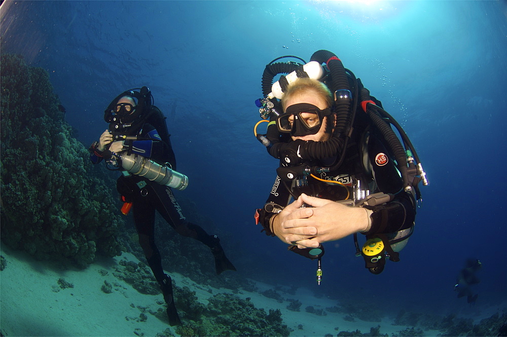 Mixed gas rebreather divers showing equipment.  Red Sea.