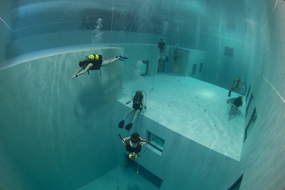 Divers in Nemon 33 pool, the deepest swimming pool in Europe, Belguim, Europe