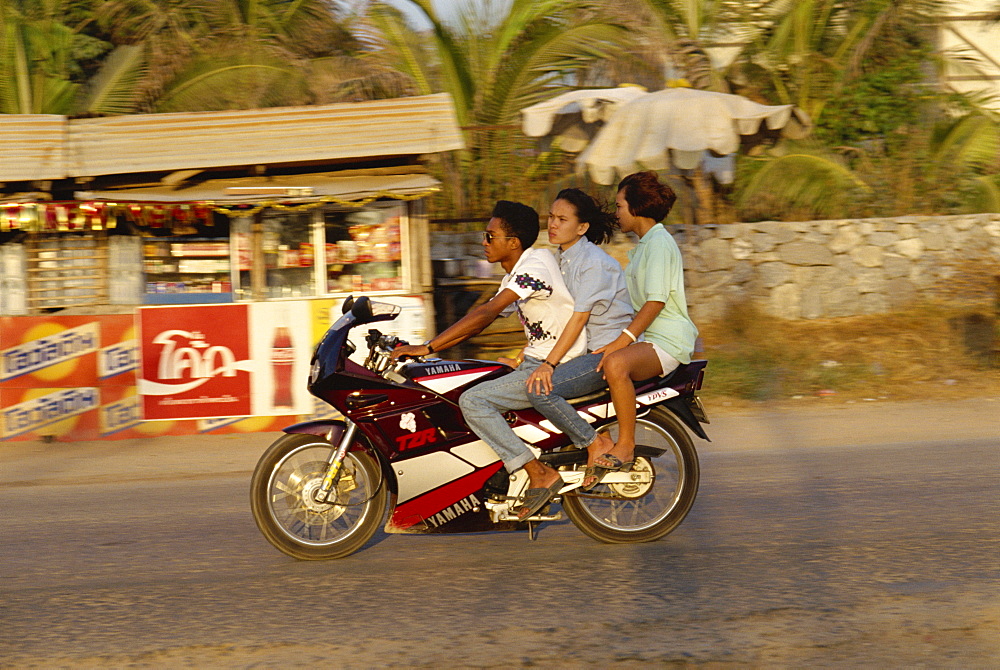 Three people riding a Yamaha motorbike at Jomtien Beach, Pattaya, Thailand, Southeast Asia, Asia