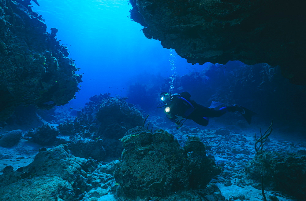 Diver in Carvern. Cayman Islands.