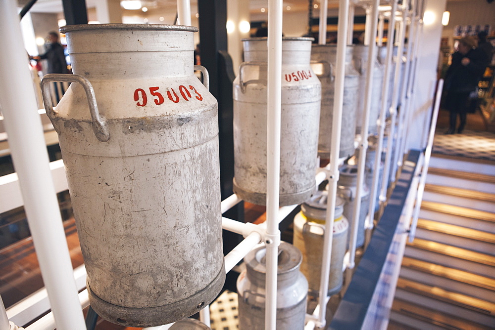 Milk churns in the cheese factory, Volendam, North Holland Province, The Netherlands (Holland), Europe