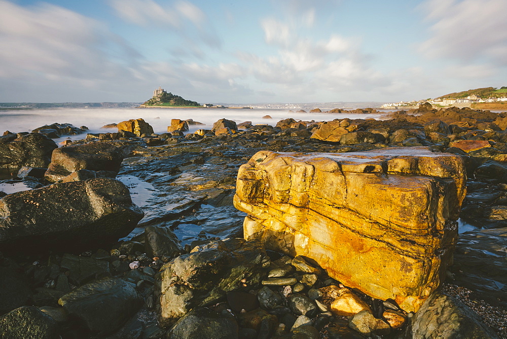 Rocky shoreline and St. Michaels Mount, early morning, Cornwall, England, United Kingdom, Europe 