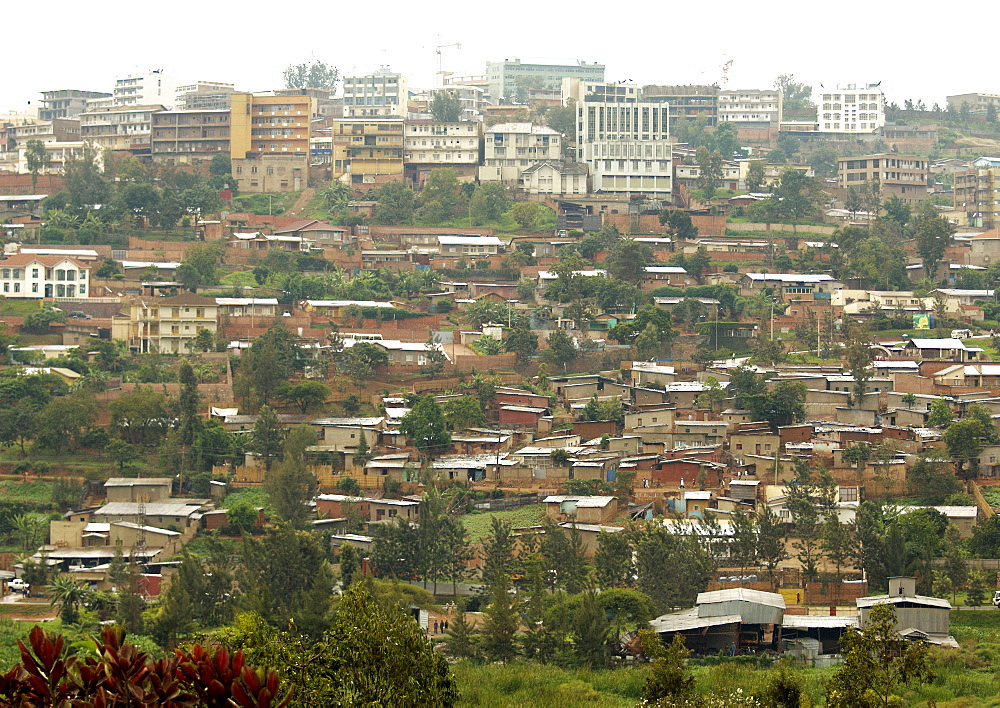 Kigali, population 965,398 (2009), is the capital and largest city of Rwanda. It is situated near the geographic centre of the nation, and has been the economic, cultural, and transport hub of Rwanda since it became capital at independence in 1962.  Government/Administrative sector is located away from the City Centre. Kigali, Rwanda, East Africa