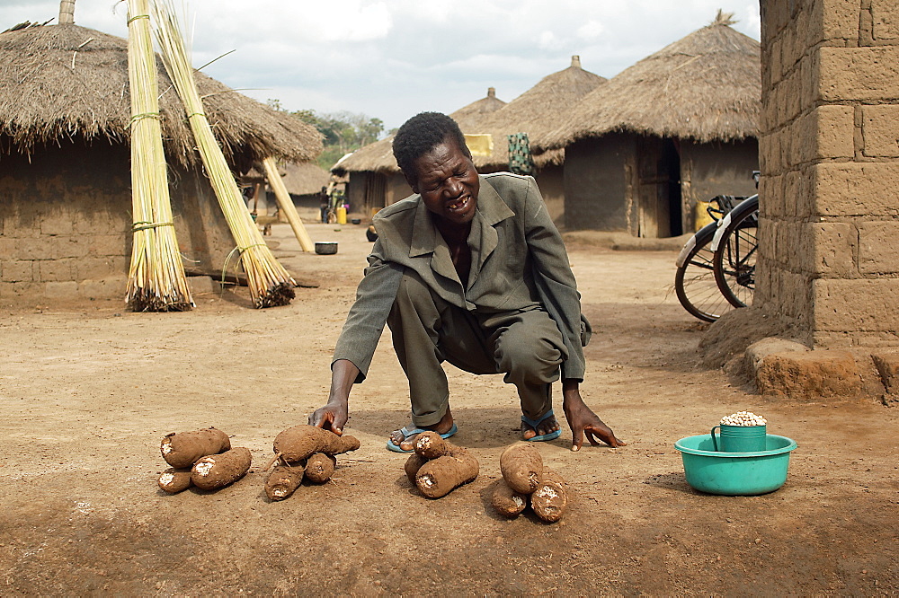 An IDP camp (internally displaced people) in Te-Tugu district of Northern Uganda has been created to accommodate the mass of Ugandan refugees fleeing the LRA (Lords Resistance Army) who are fighting the Ugandan government and its people.  With all attempts to be self-sufficient in these camps, Yams are an important vegetable for survival. The tubers can be stored up to six months without refrigeration, which makes them a valuable resource for the yearly period of food scarcity at the beginning of the wet season. Te-Tugu, Uganda, East Africa