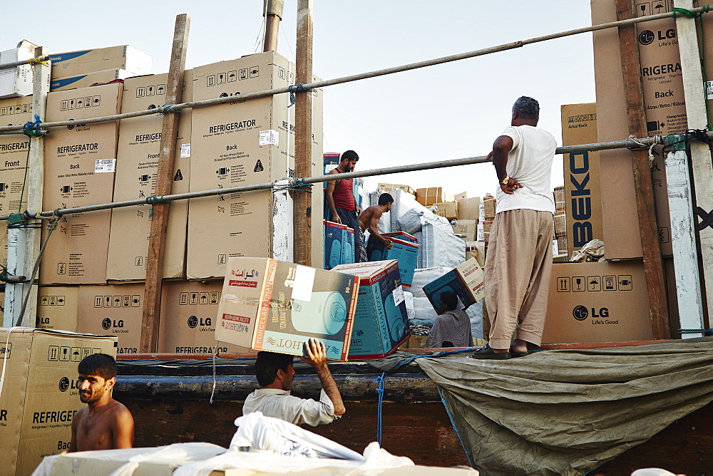 Free-trade port Dubai Creek, with dhows piled high with a range of goods, Dubai, United Arab Emirates, Middle East