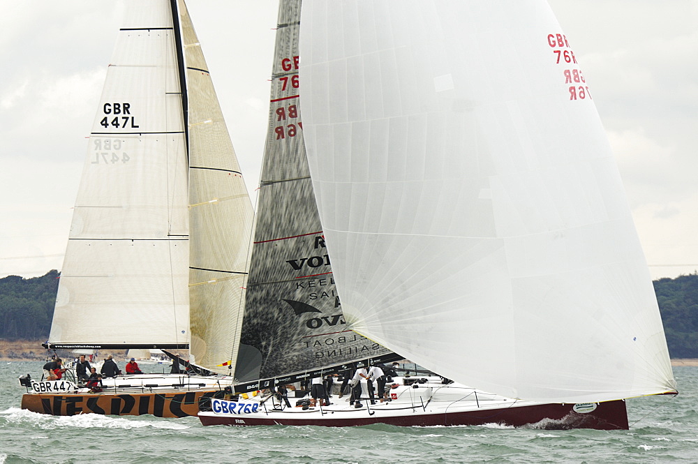 Action dropping the Spinnaker at Skandia Cowes Week 2008 Finish Line