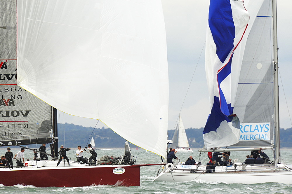 Action dropping the Spinnaker at Skandia Cowes Week 2008 Finish Line