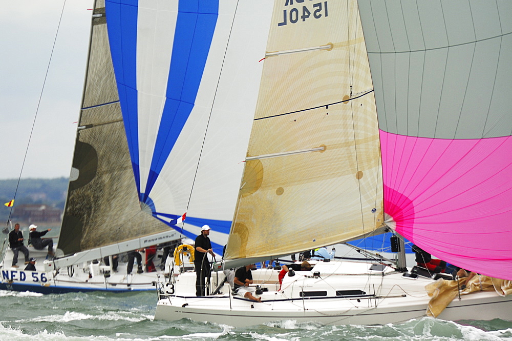 Action dropping the Spinnaker at Skandia Cowes Week 2008 Finish Line