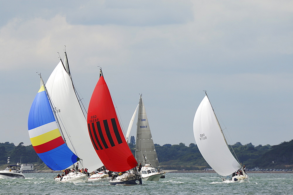 Action dropping the Spinnaker at Skandia Cowes Week 2008 Finish Line