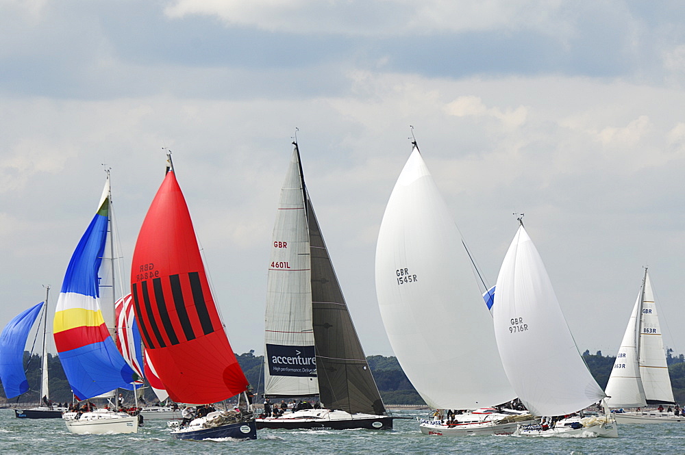 Action dropping the Spinnaker at Skandia Cowes Week 2008 Finish Line