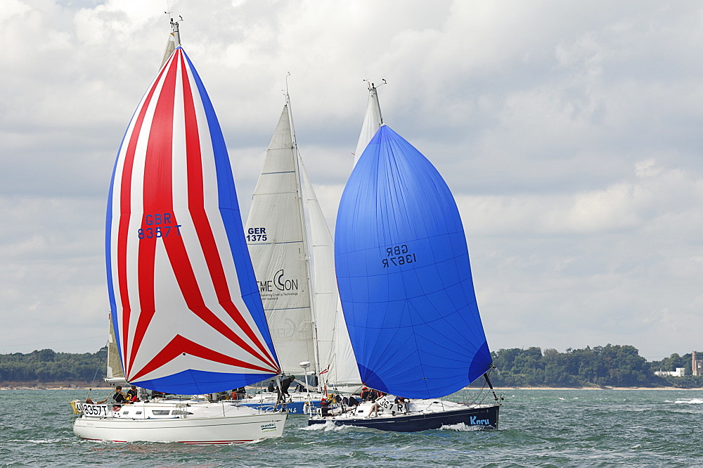 Action dropping the Spinnaker at Skandia Cowes Week 2008 Finish Line