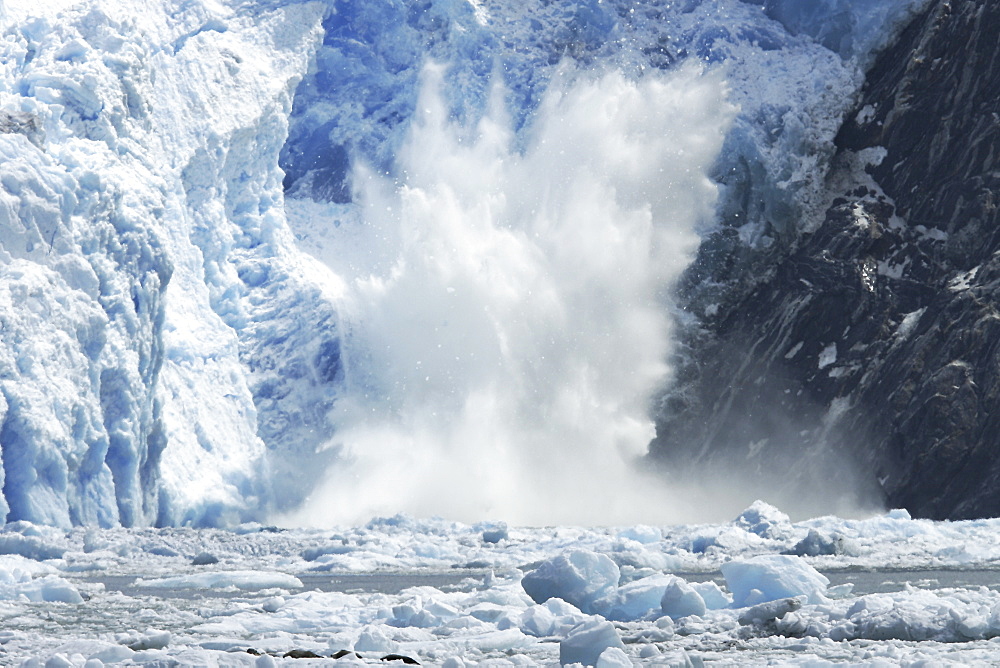 The Sawyer Glacier calving, a tidewater glacier at the end of Tracy Arm in Southeast Alaska, USA. 