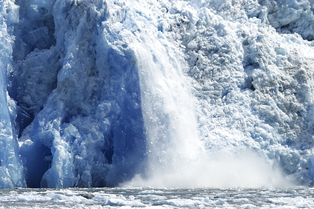 The Sawyer Glacier calving, a tidewater glacier at the end of Tracy Arm in Southeast Alaska, USA.