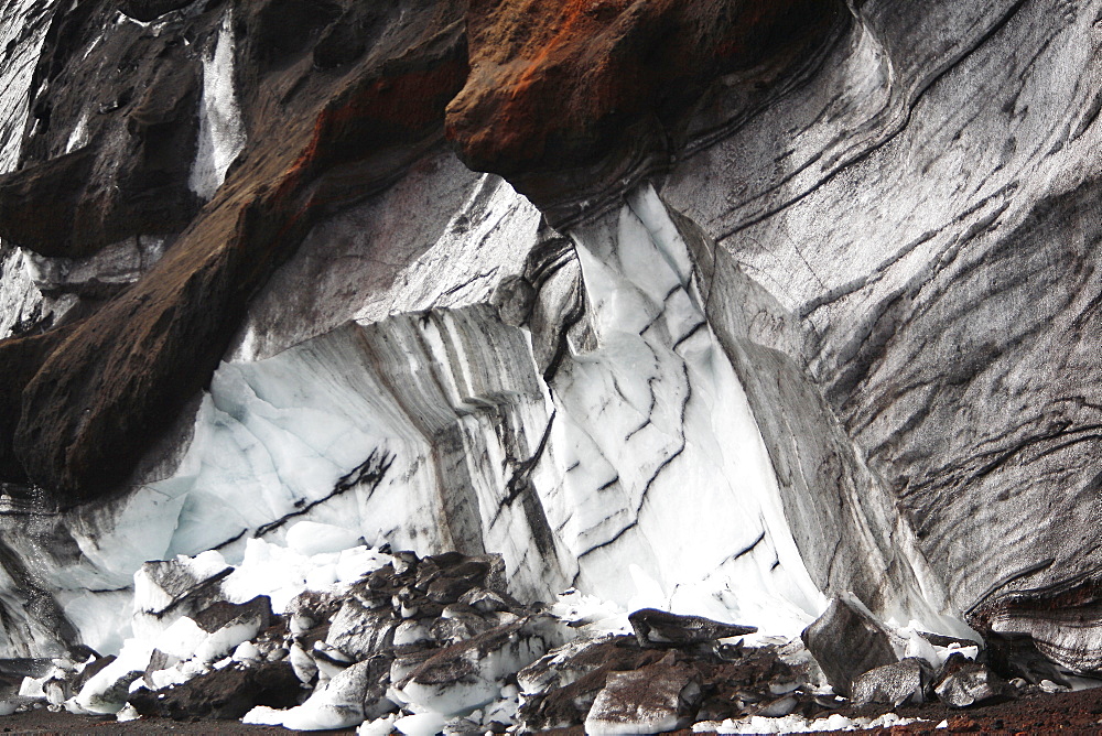 Close up views of glacial ice and ash after the 1969 eruption on Deception Island in Antarctica