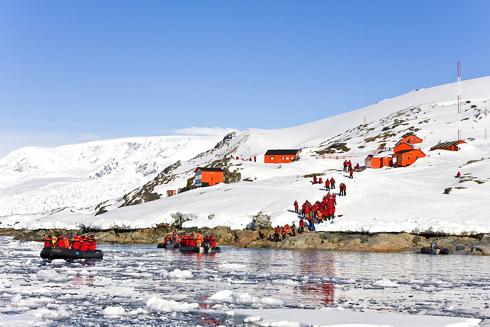 Lindblad Expeditions guests visiting the Argentine research station Almirante Brown in Paradise Bay in Antarctica as part of expedition travel. NO MODEL RELEASES FOR THIS IMAGE.