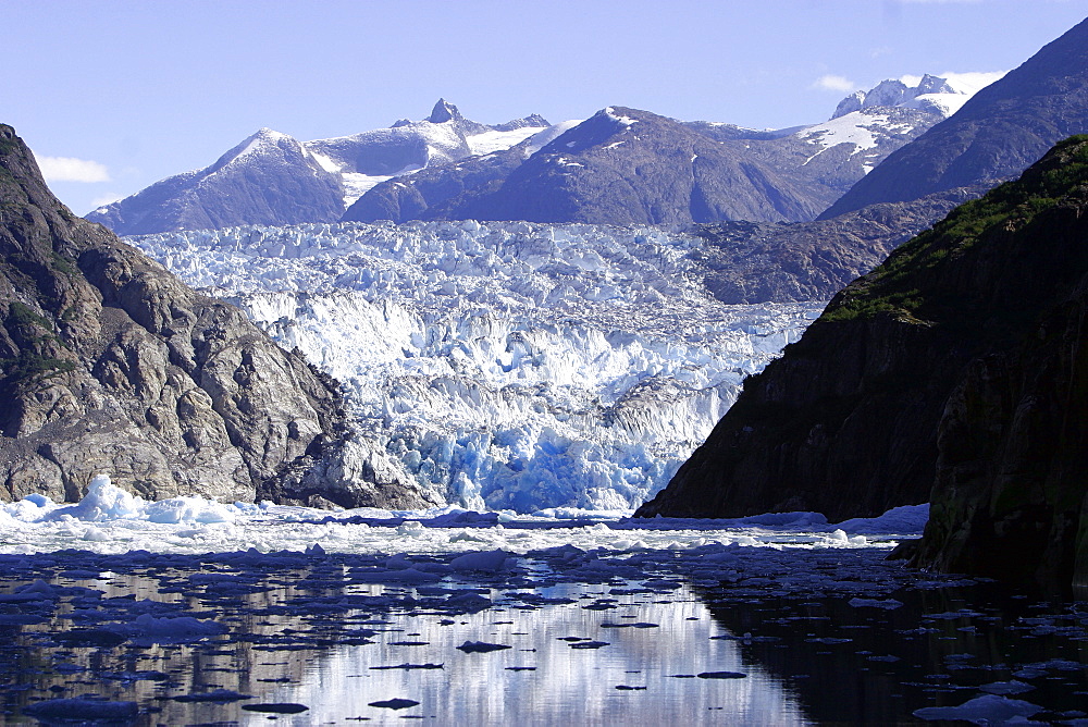 South Sawyer Glacier with icebergs/bergy bits calved off in Tracy Arm, Southeasat Alaska, USA. Pacific Ocean.