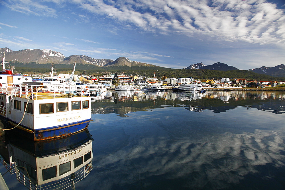 The harbor at Ushuaia, Argentina on a very rare calm and sunny day. Ushuaia claims to be the southernmost city in the world.