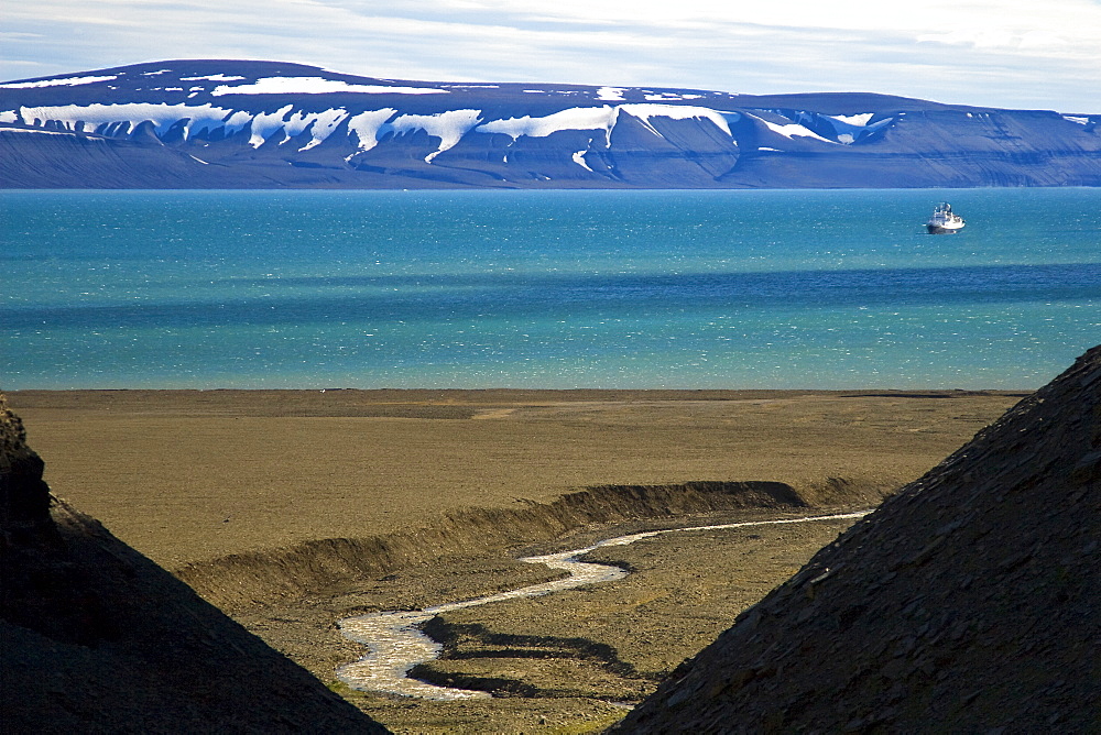 A view of the National Geographic Endeavour from the cliffs at Diskobukta on the western side of EdgeØya in the Svalbard Archipelago in the Barents Sea.