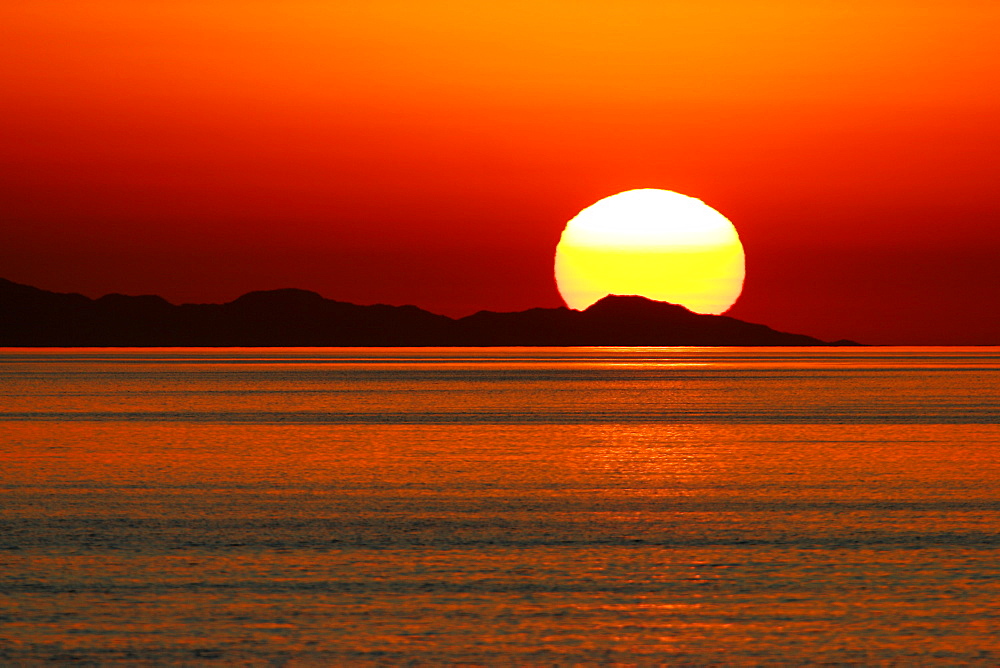 Sunrise over the calm waters of the Gulf of California (Sea of Cortez), Baja, Mexico.