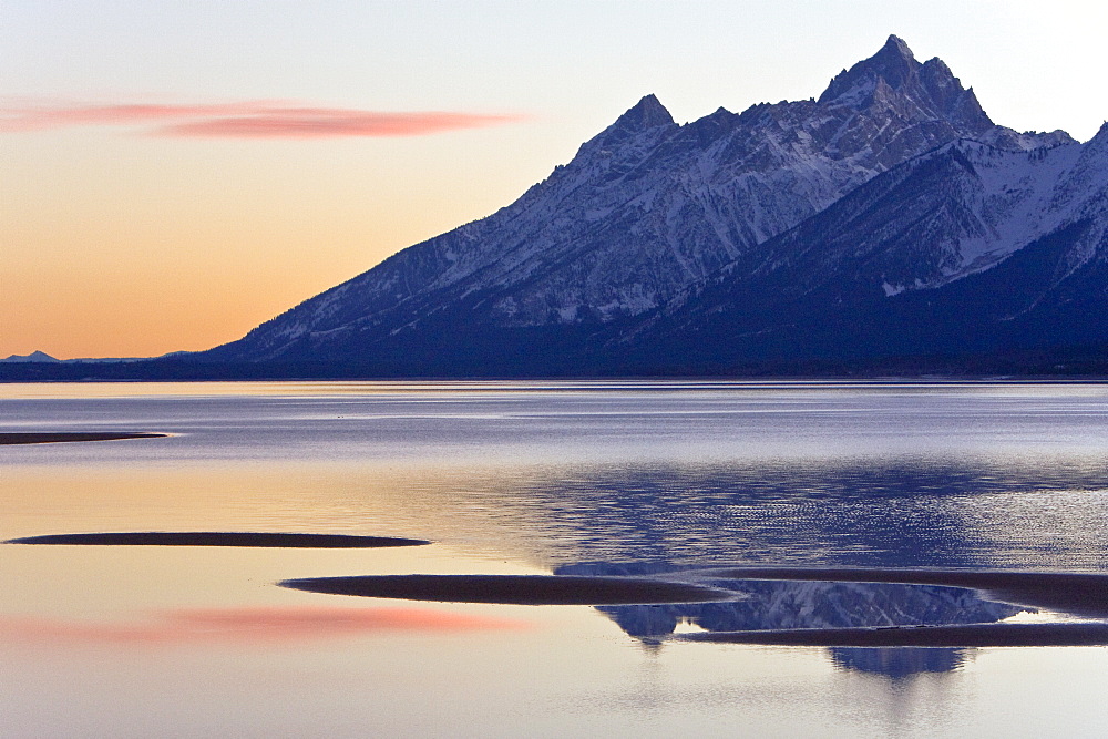 Changing light on the Teton Mountain Range, outside of Jackson Hole, Wyoming.