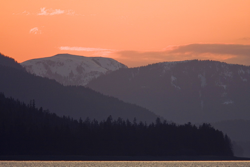 Sunset over Chichagof Island from Peril Strait in Southeast Alaska in the late springtime, USA, Pacific Ocean.