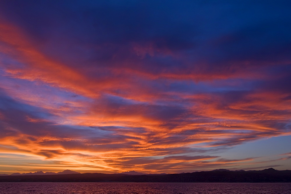 Sunset over the Baja Peninsula in the Gulf of California (Sea of Cortez), Baja California Sur, Mexico.