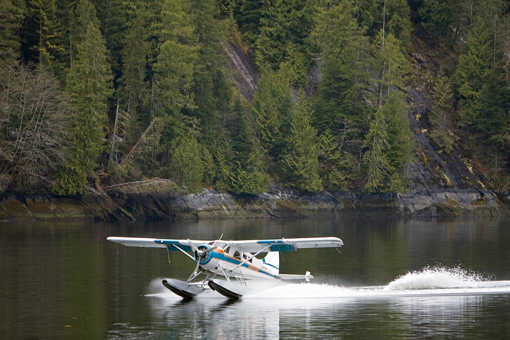 Float Planes operating in southeast Alaska, USA, Pacific Ocean. The float plane is one of the most common ways to travel in the calm waters of the inside passage and throughout Alaska.