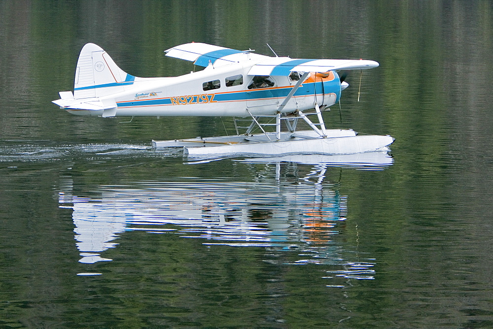 Float Planes operating in southeast Alaska, USA, Pacific Ocean. The float plane is one of the most common ways to travel in the calm waters of the inside passage and throughout Alaska.