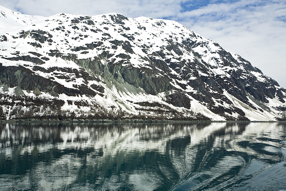 Views of Grand Pacific glacier from on board the Lindblad Expedition vessel National Geographic Sea Lion in Glacier Bay National Park, Southeast Alaska, USA. Pacific Ocean.